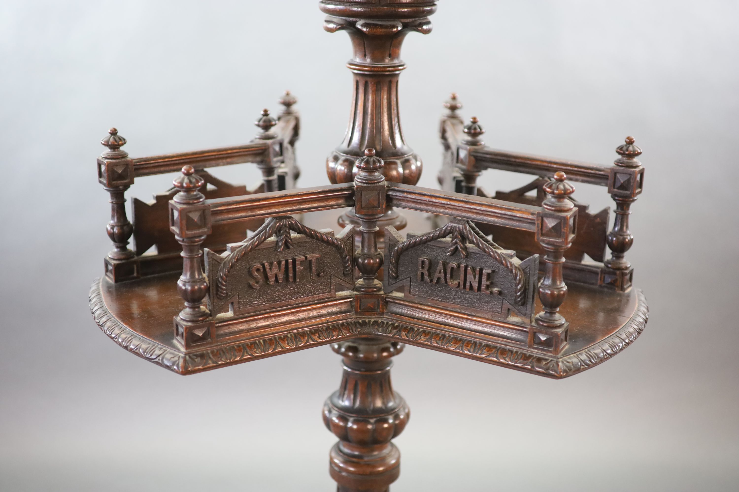 An unusual 19th century Black Forest oak revolving bookcase, W.66cm H.158cm